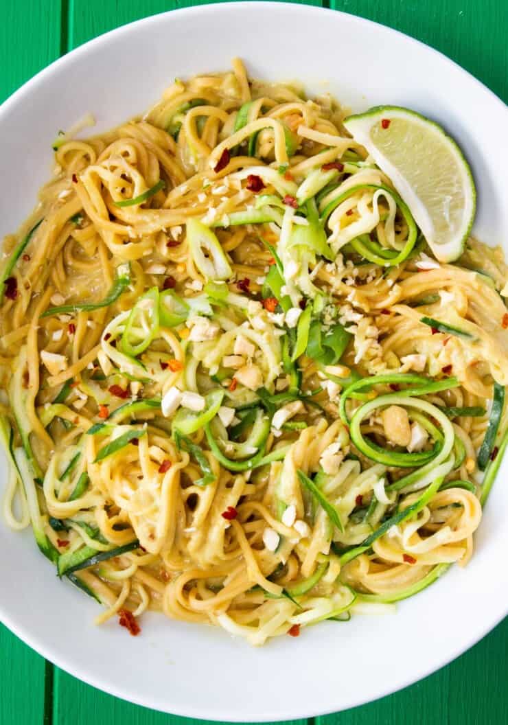 Close up shot of bowl of vegetable noodles with crunchy vegetables