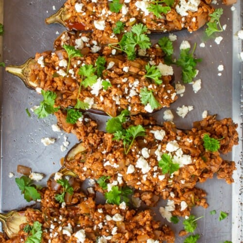 Overhead shot of Moroccan Inspired Veggie Aubergines on baking tray