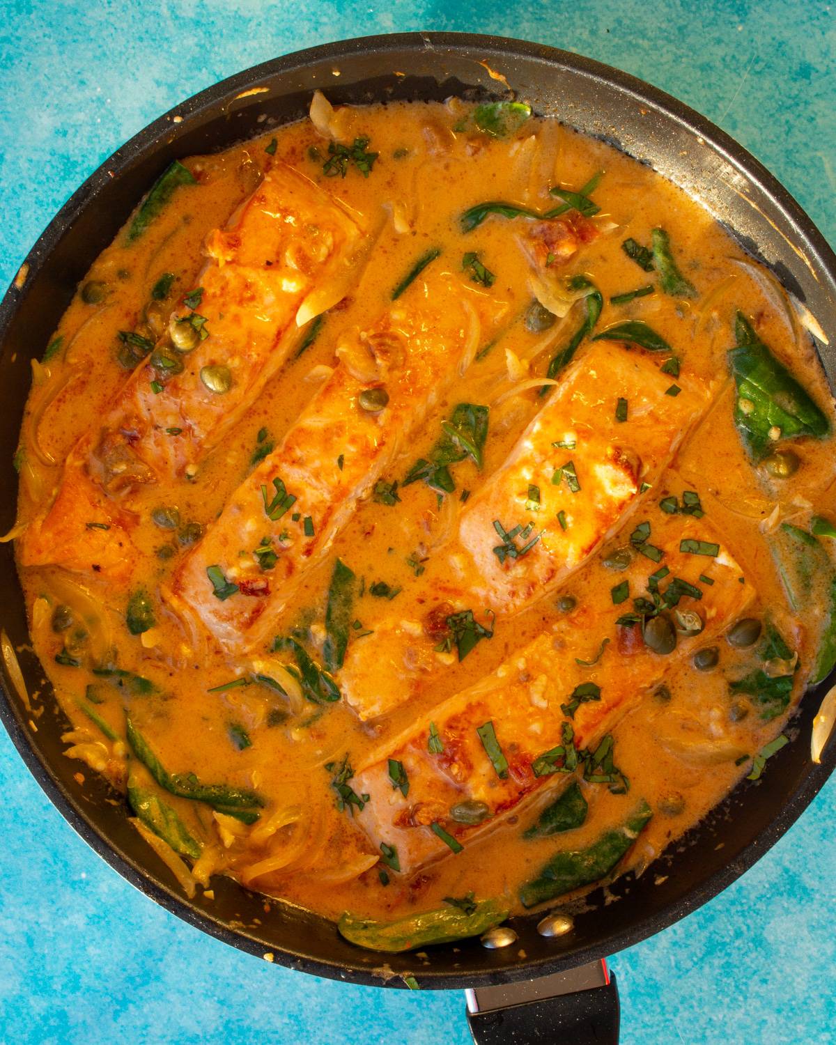 Overhead shot of Tuscan Inspired Seared Salmon in large pan