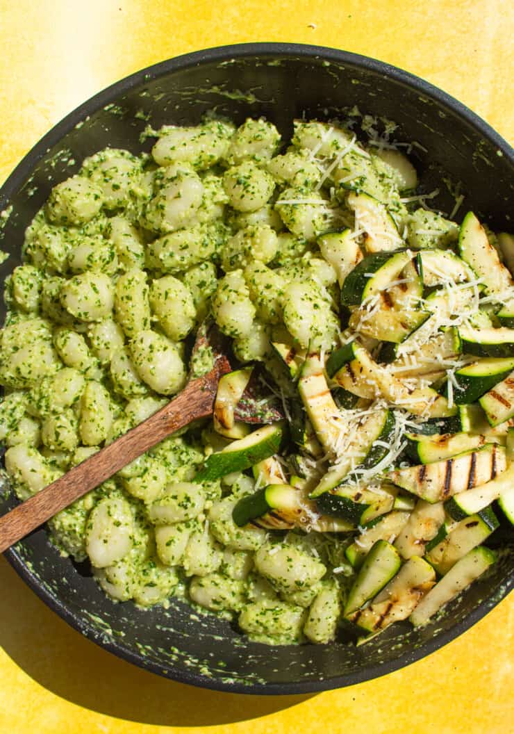 Overhead shot of Rocket Pesto Gnocchi with Charred Courgette in large pan