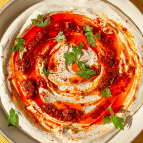 Dip with harissa oil in bowl