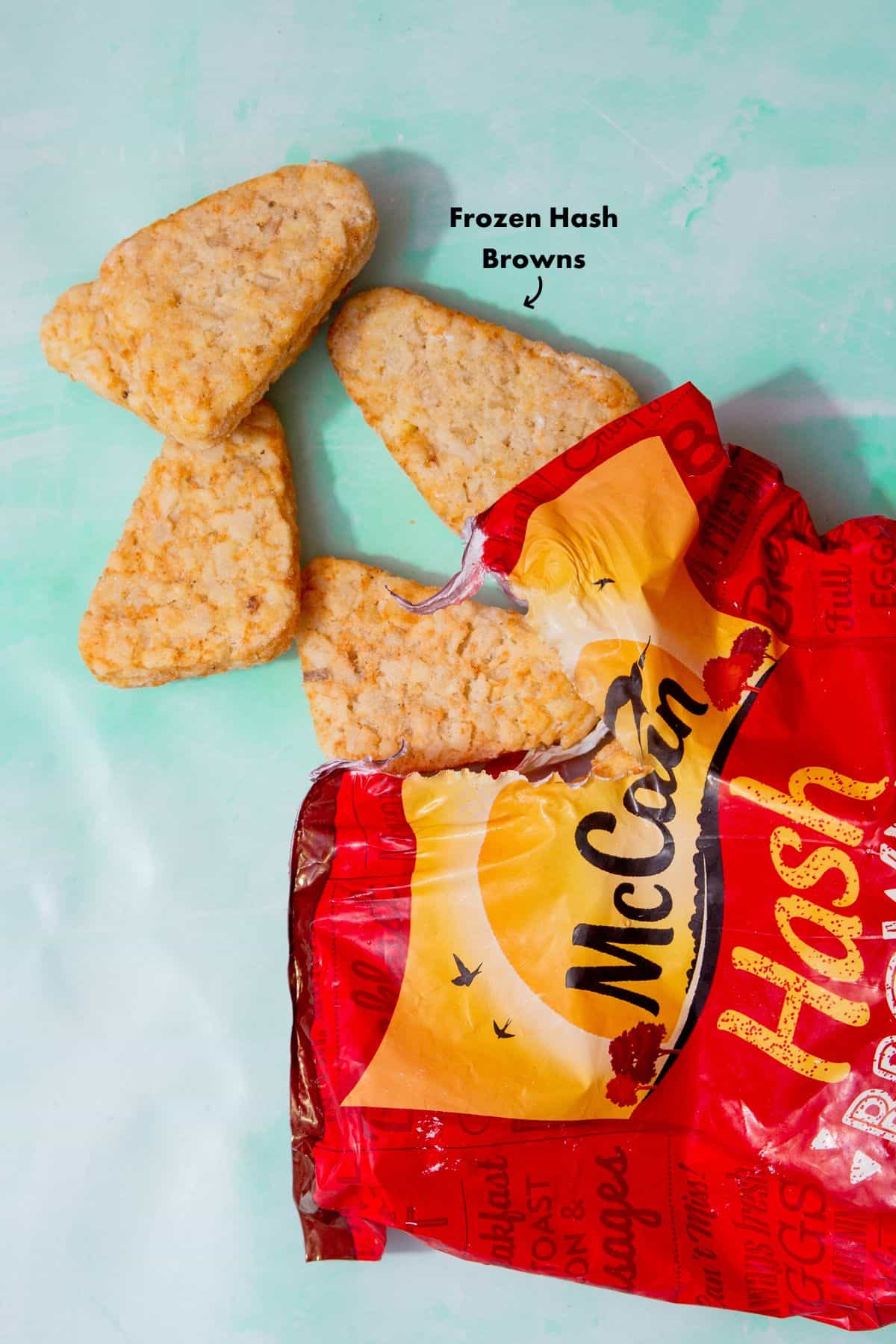A few hash browns fallen out of the plastic labelled packaging from McCains.