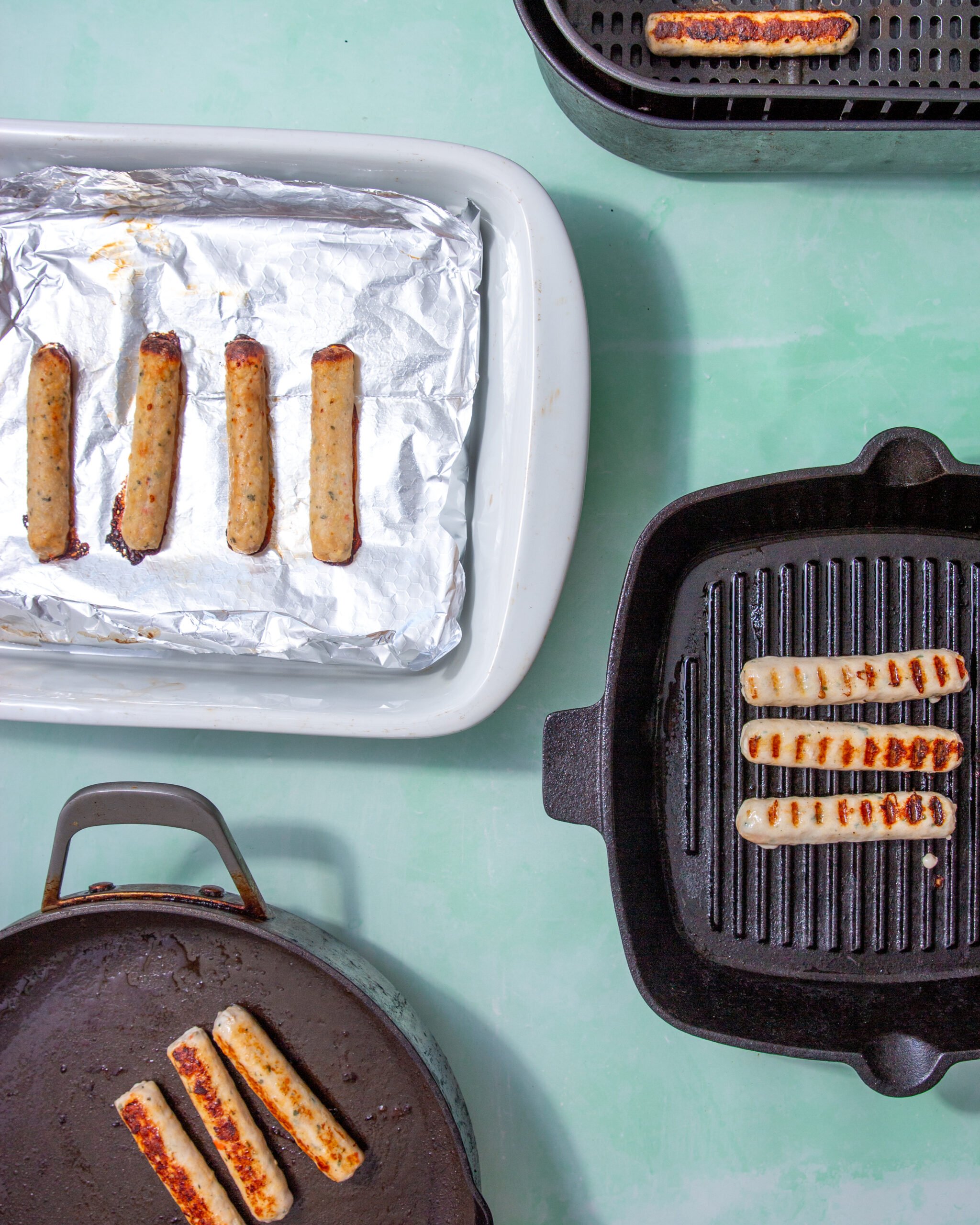 chicken sausage cooked four ways, in the air fryer, in the oven, in a pan, and on a grill.