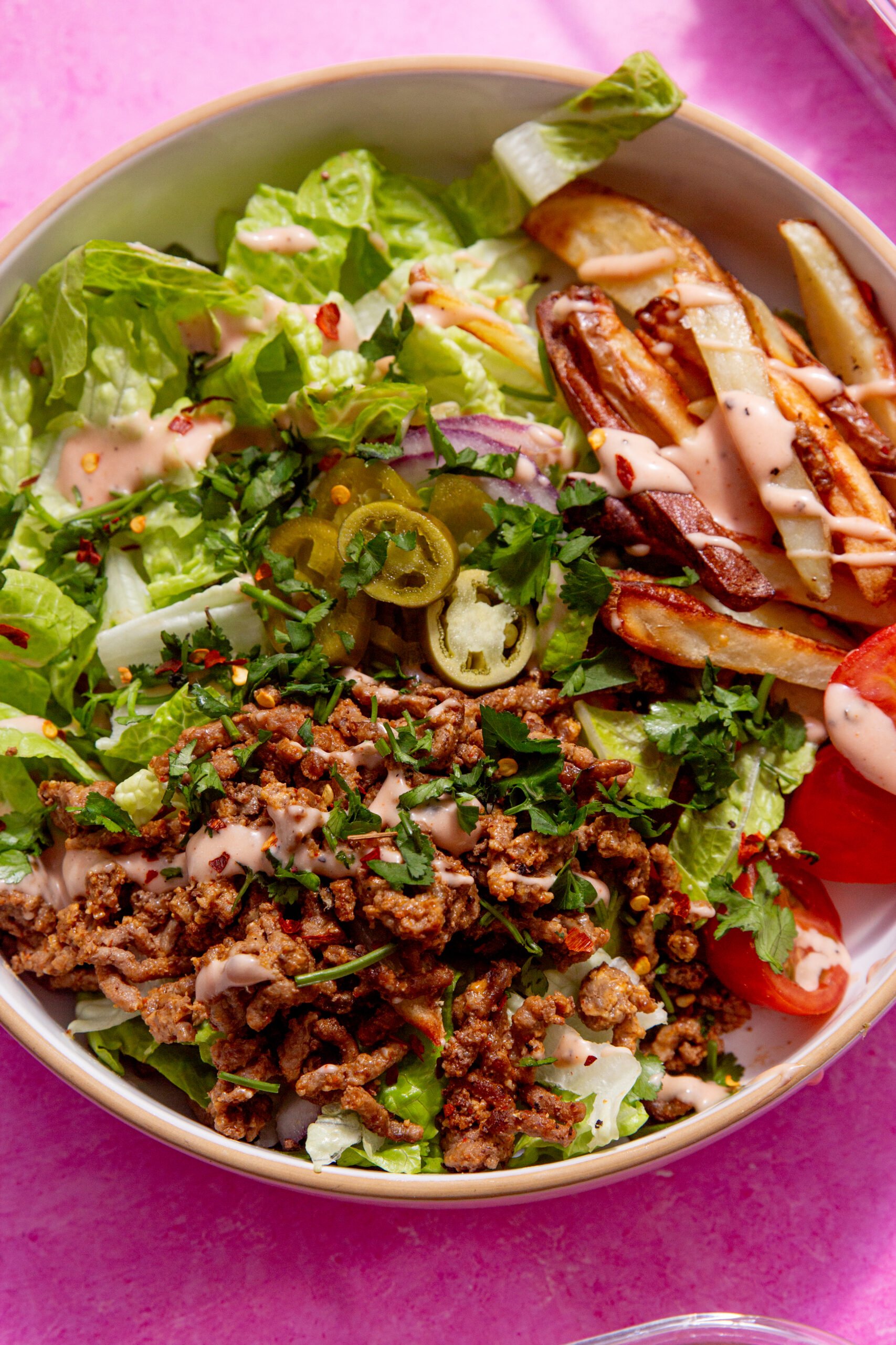 up close look at prepared burger bowl.