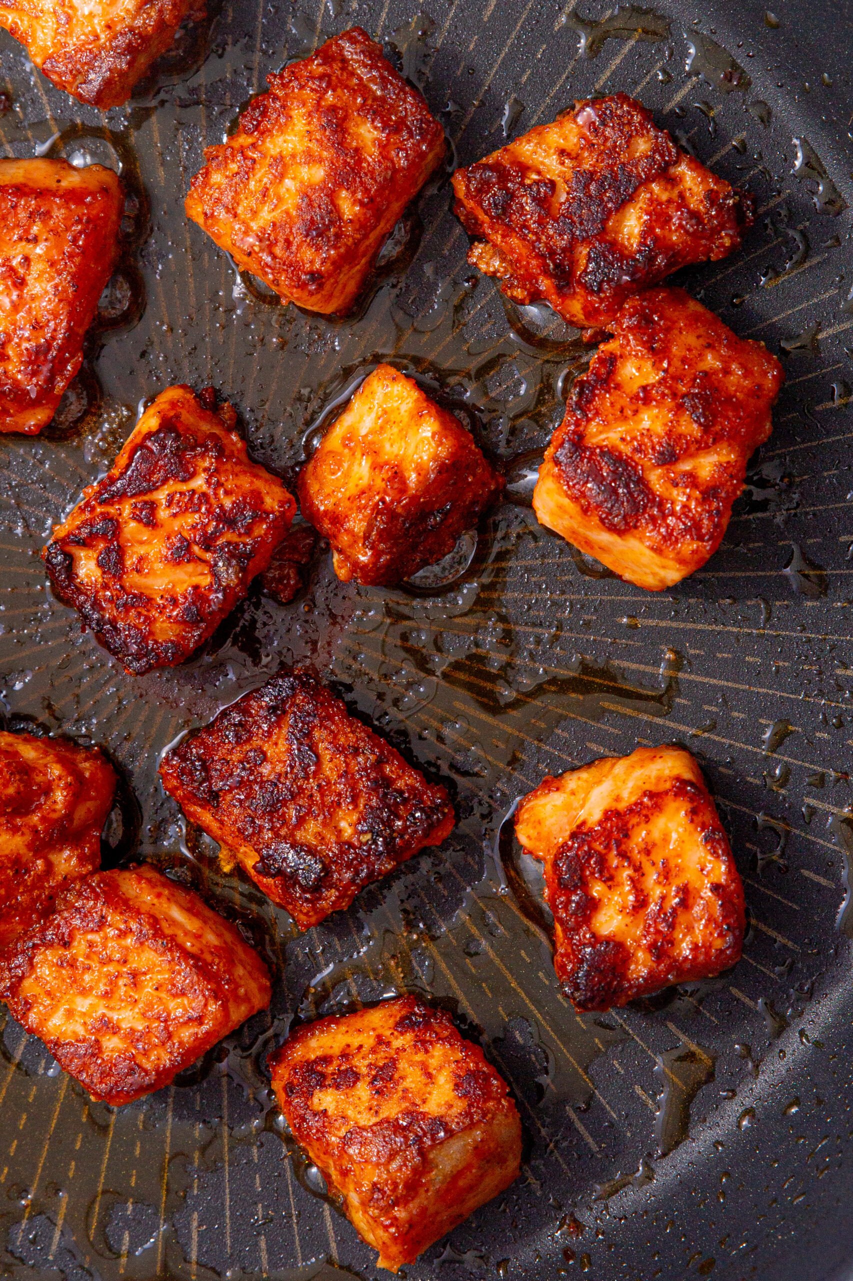 close up image of pan fried salmon bites