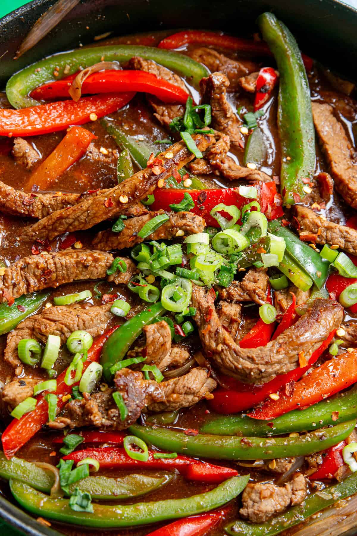 A bowl of meat and vegetables.