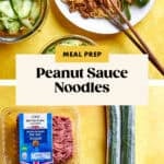 A bowl of Peanut Sauce Noodles with cucumber ribbons and chopsticks sits on a yellow surface. Below are uncooked ingredients: ground pork, cucumbers, and noodles.