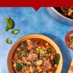 Top-down view of a bowl of Beef Minestrone Soup with vegetables and greens on a blue surface, surrounded by fresh basil, a spoon, and grated cheese. Text overlay promotes Beef Minestrone Soup as perfect for meal prep.