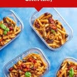 Six glass meal prep containers filled with Mediterranean Pasta Salad featuring roasted vegetables and chorizo, garnished with fresh basil, arranged on a blue surface. Text above describes this as a Mediterranean Pasta Salad Sunday meal prep option.