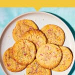 A plate of eight golden brown Funfetti Cookies with colorful sprinkles sits on a light blue surface. Text above reads, Only 10 minutes prep. Easy & chewy Funfetti Cookies. Website: www.beatthebudget.com.