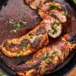 A sliced, oven-roasted pork tenderloin in oven is served in a cast-iron skillet, garnished with chopped parsley. Text overlay reads 25-Minute Pork Tenderloin Loin Recipe and Oven Roasted to Perfection.