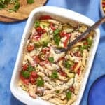 High protein baked feta pasta with bacon in meal prep containers