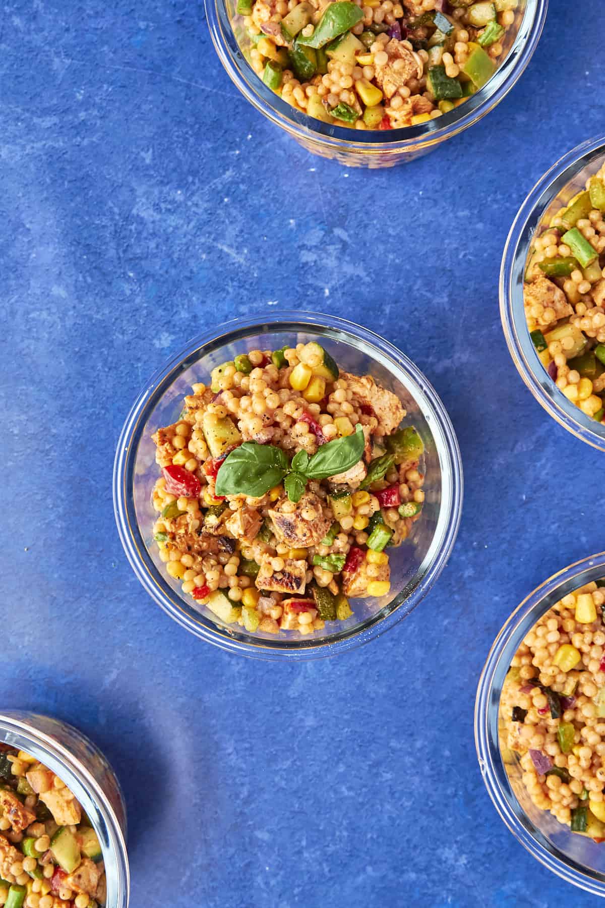 Close-up of Nandos giant couscous salad with peri peri chicken and roasted vegetables