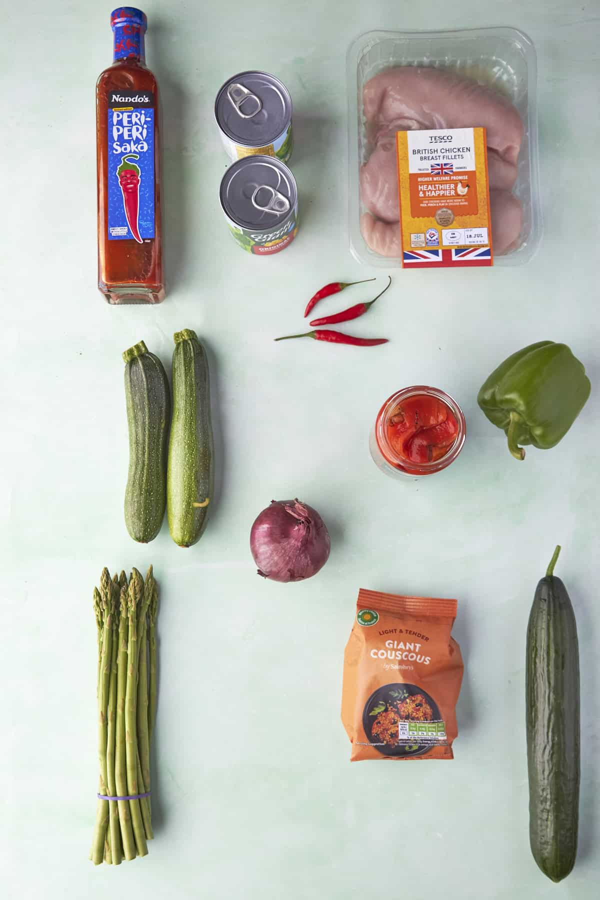 Ingredients for Nandos inspired giant couscous salad laid out flat