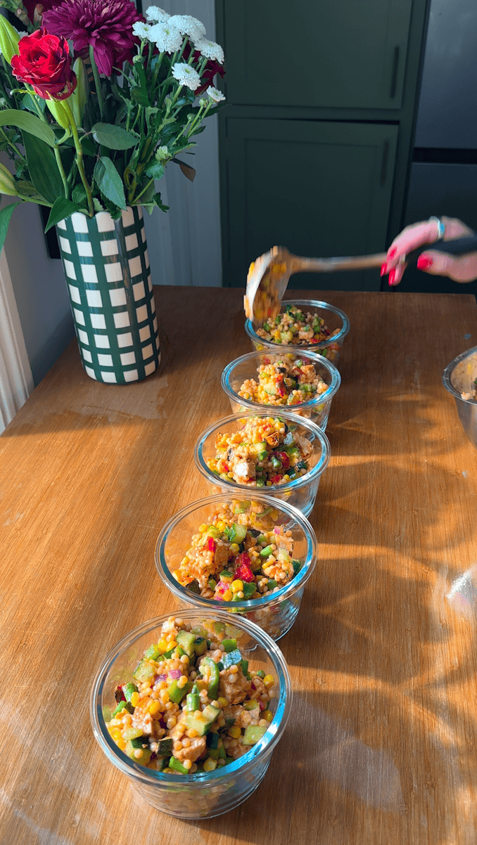 All Nandos salad ingredients combined in a large bowl ready to portion into meal prep containers