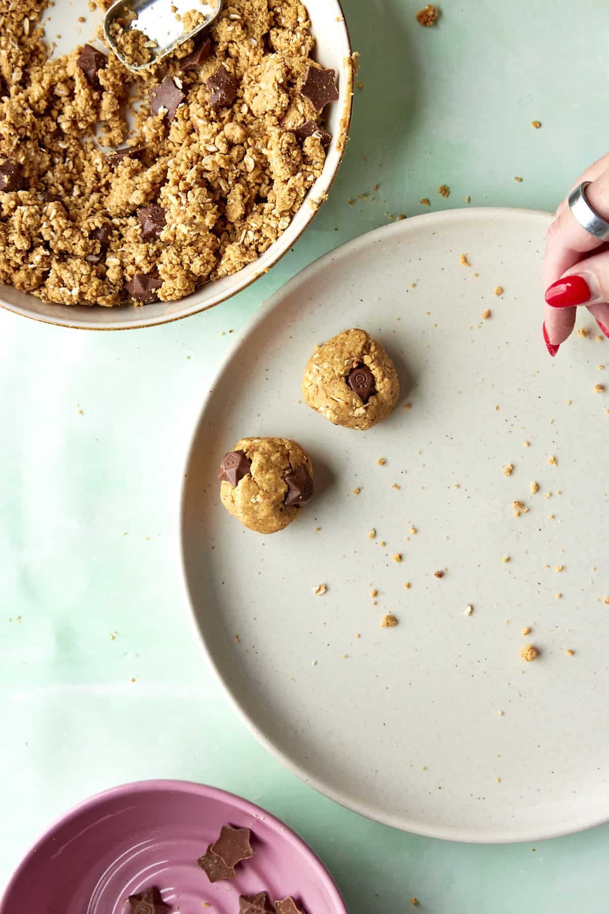 Magic Stars chocolate being stirred through the protein ball dough.